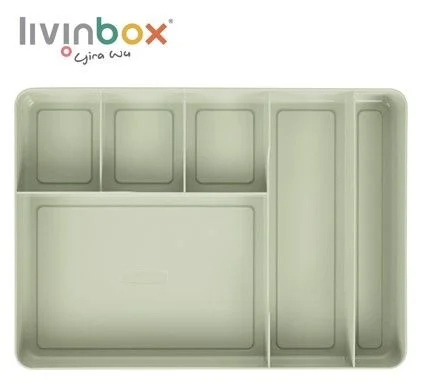 Pengatur laci meja rapi dengan 6 kompartemen berwarna hijau.