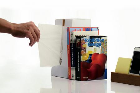 Desktop tissue holder with bookend function.
