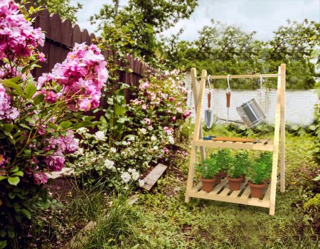 Hopfällbar växtvisningshållare