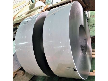 316L stainless steel strip with BA surface finish and PVC black / white protective film.