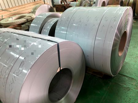 304 stainless steel strip with BA surface and PVC black / white protective film.