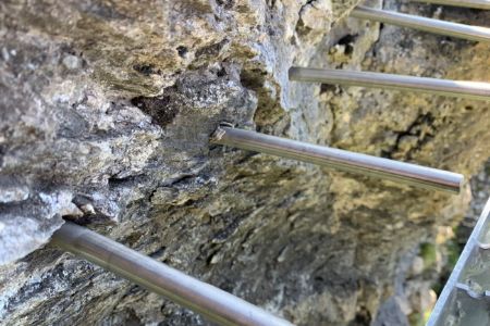 Anchoring steel bars on natural stone to secure the fallen gaps