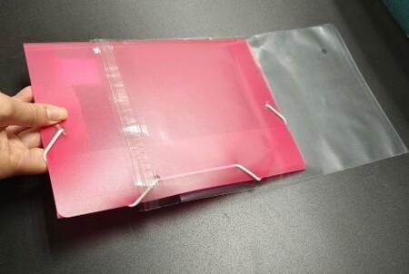 Individual packaging process using EU-compliant, recyclable PP protective sleeves.