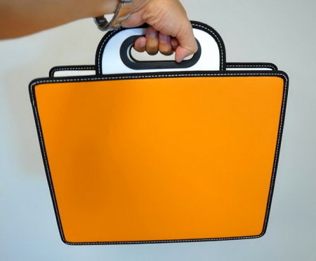 छिपे हुए हैंडल डिज़ाइन के साथ कैरी केस।