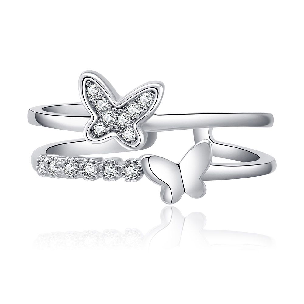 The Glittering Double Butterfly Ring featuring two butterfly designs, one encrusted with cubic zirconia gemstones, on a white background.
