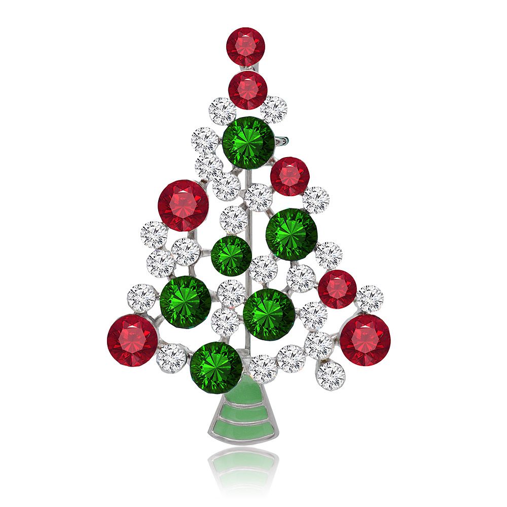 A close-up of the Crystal Christmas Tree Brooch, showcasing its detailed branches adorned with red, green, and white Czech crystals on a rhodium-plated base.