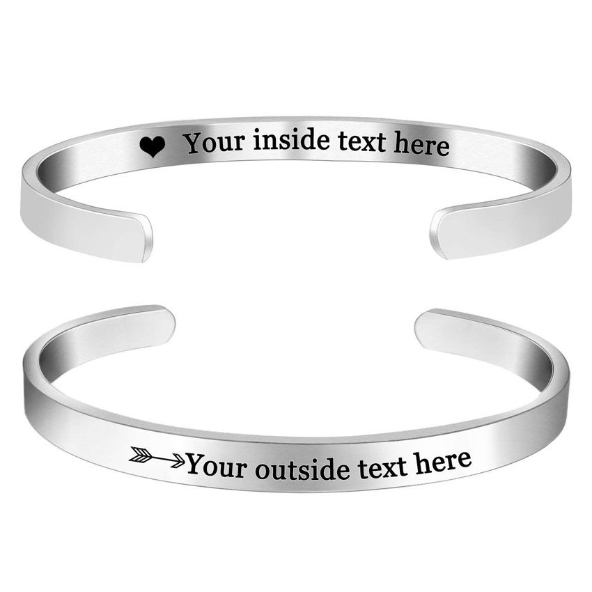 A polished silver stainless steel bangle bracelet by JR Fashion Accessories, showcasing custom engraving options for personalization.