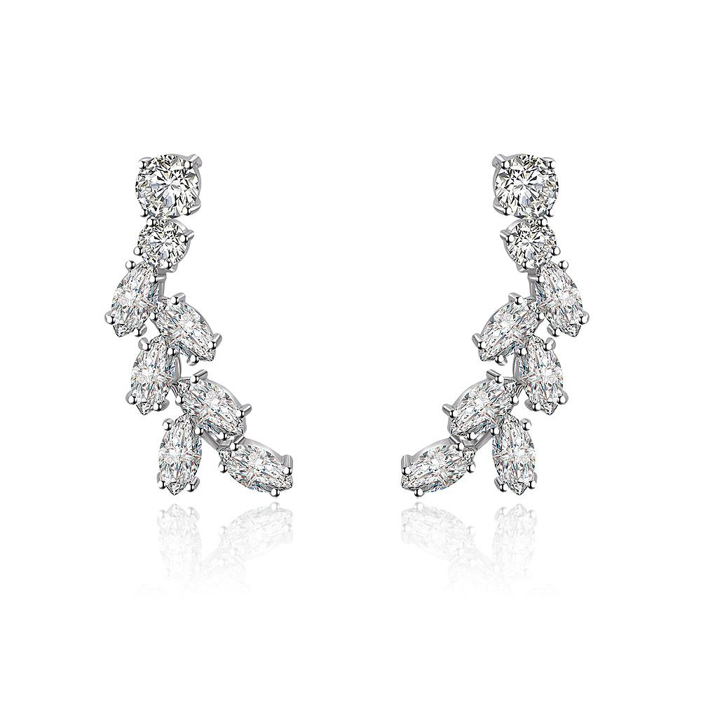 Vue de face des boucles d'oreilles pendantes Rhodium Firework, mettant en valeur le design en cascade de pierres en zircon cubique taillées en marquise et en rond, serties dans du laiton plaqué rhodium poli.