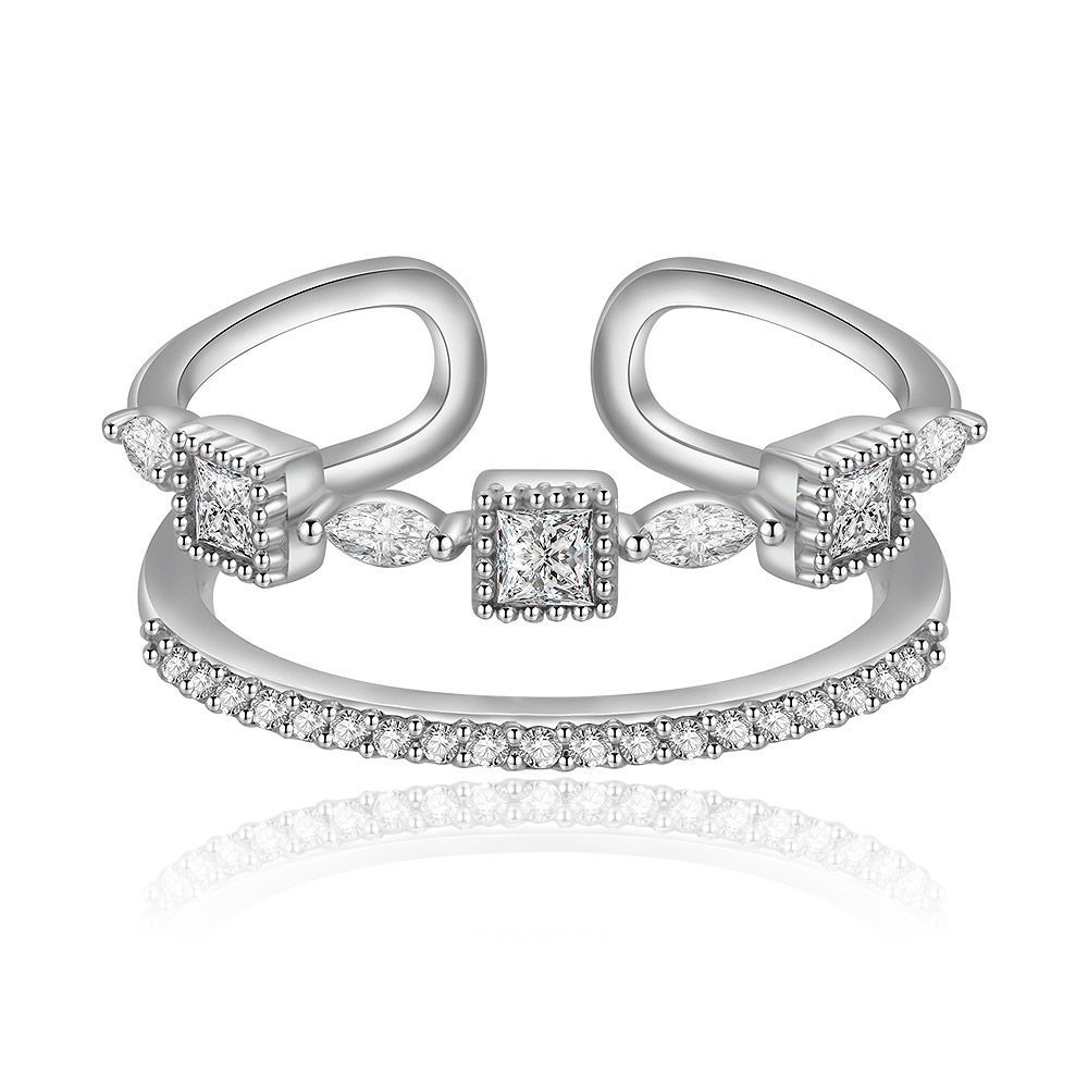 A close-up of the Signature 2-Row Stackable Ring, showcasing its intricate two-row design with brilliant square-cut and round-cut cubic zirconia stones set in polished rhodium-plated brass.