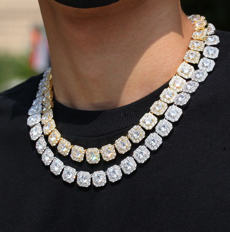 A close-up of two custom iced out square chain bling hip hop necklaces displayed on a black background, showcasing the brilliant cubic zirconia stones.