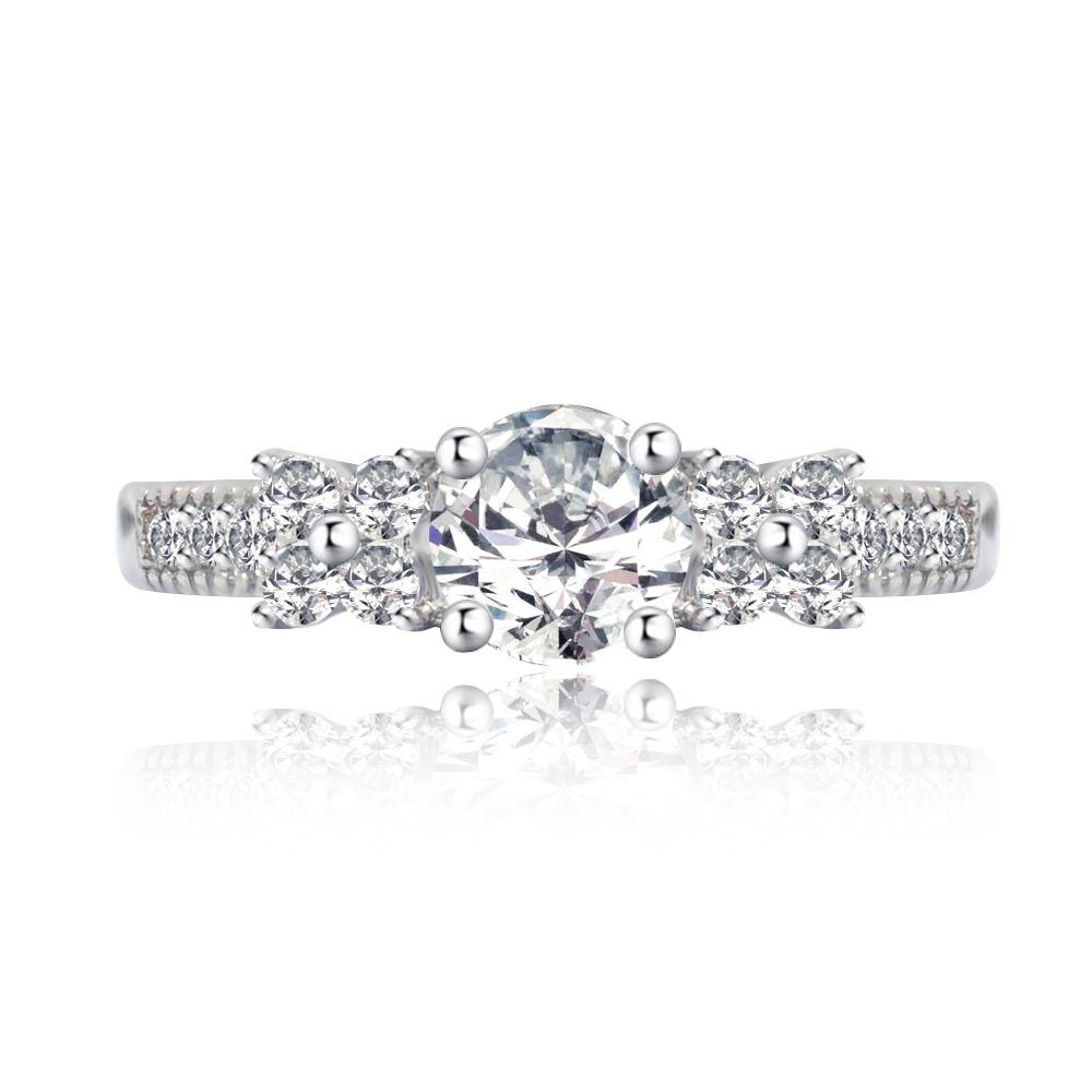 Front view of the Dreamy Bridal Ring, showcasing three princess-cut cubic zirconia stones on a rhodium-plated band with milgrain details.