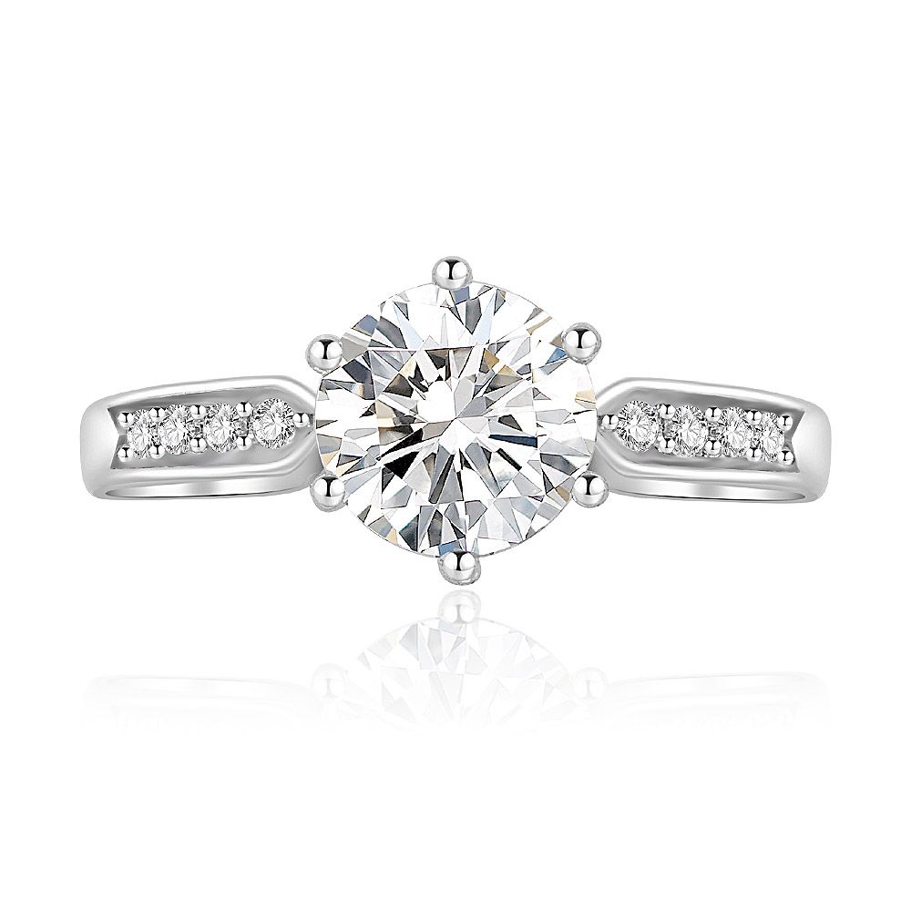 A close-up of the 6 Claws Solitaire Ring, showcasing its prominent central cubic zirconia stone and sparkling accent stones on the rhodium-plated band.