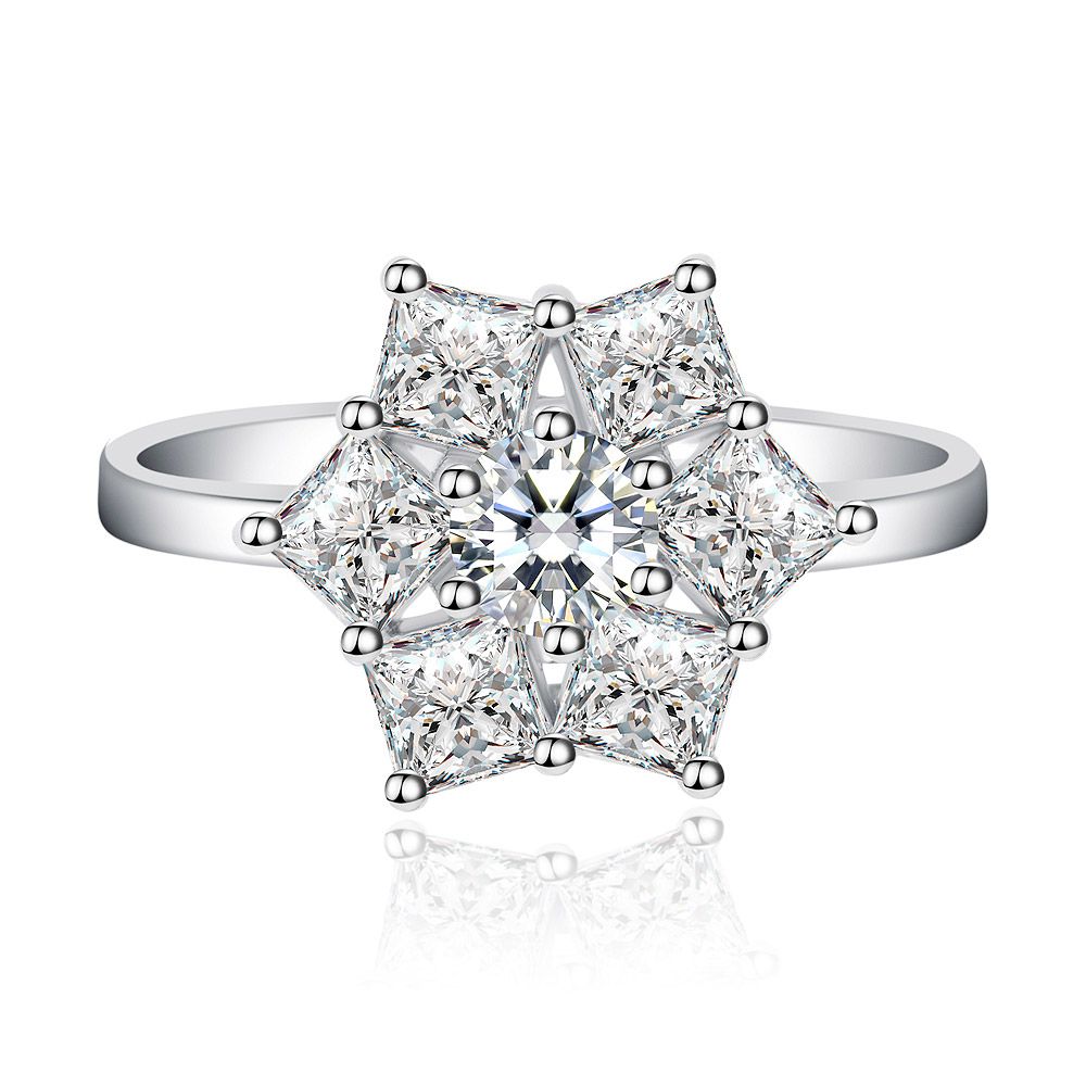 Front view of the Six Star Cubic Zirconia Spinning Ring, showcasing the seven-stone star cluster and polished rhodium-plated band.