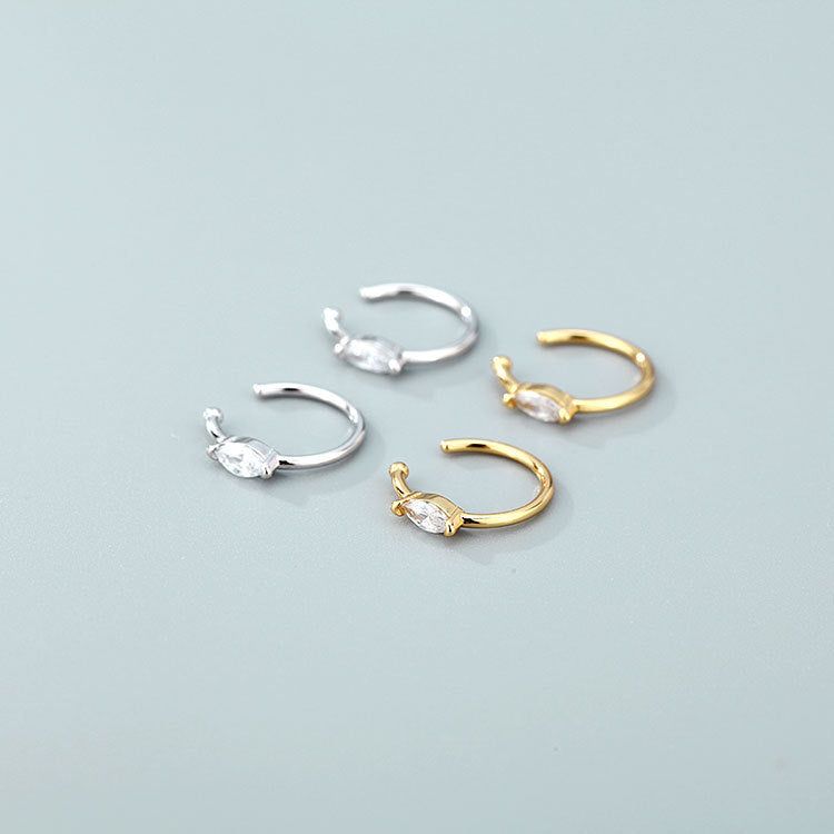 A product showcase of 925 sterling silver no-piercing nose ring cuff clips, available in both silver and gold finishes, each adorned with a delicate clear gemstone.