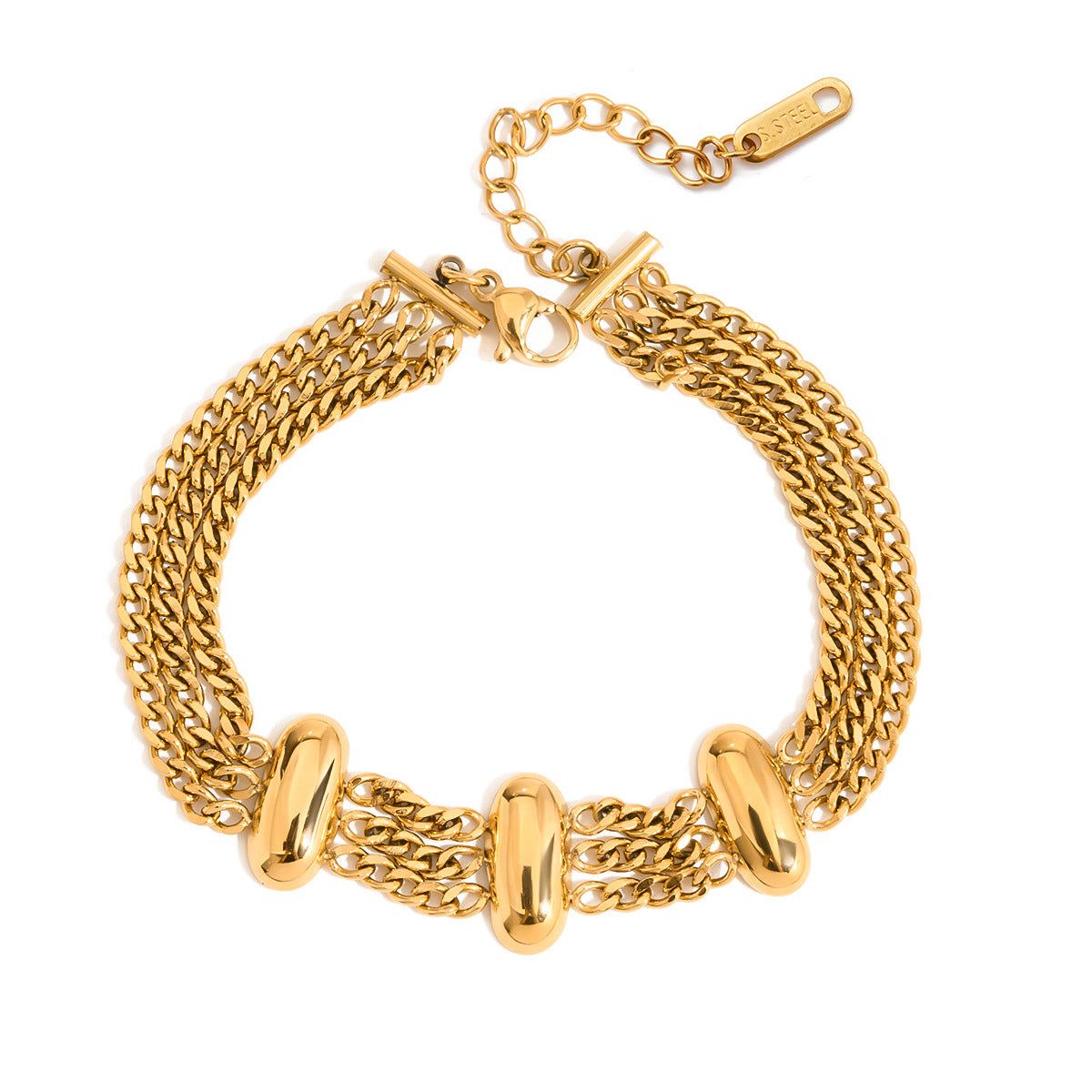 Un ensemble complet de 5 bracelets en acier inoxydable doré avec des maillons de chaîne variés et des décorations ovales, exposé sur un fond neutre.