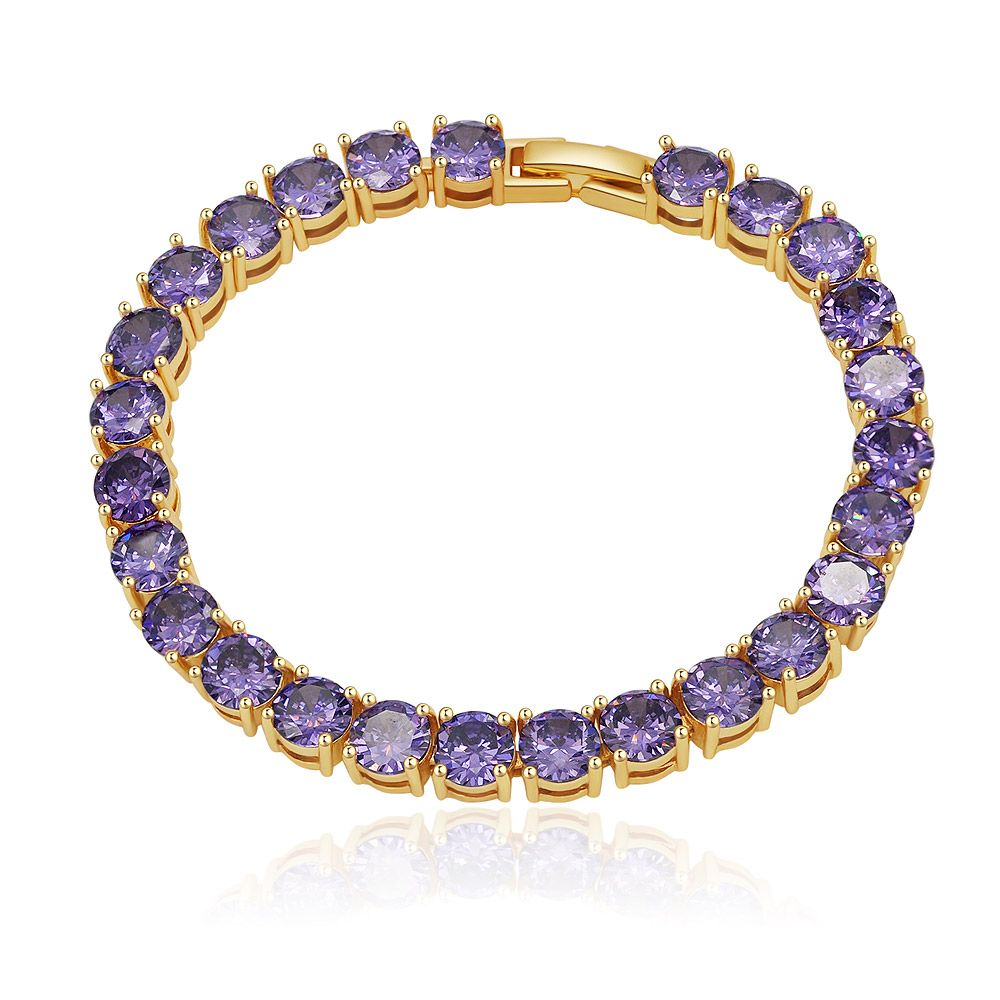 Close-up of the Purple Sheen Gold Tennis Bracelet, highlighting the vibrant violet cubic zirconia stones set in a gold-plated brass prong setting.