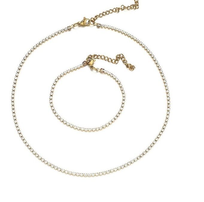 Élégant ensemble de bijoux en cristal en acier inoxydable plaqué or comprenant un collier et un bracelet assortis, modèle JRS-014.