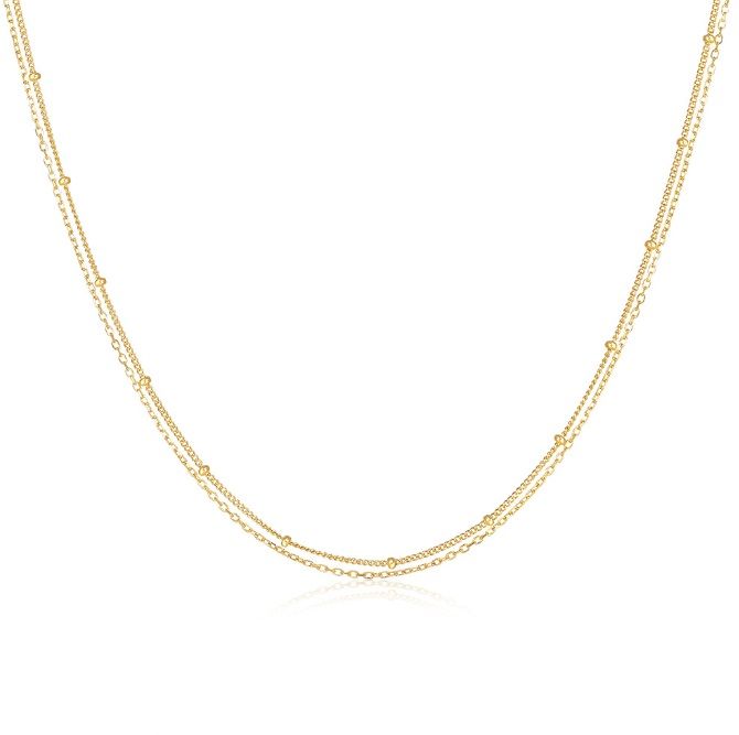 Una vista detallada del collar de cadena chapado en oro de plata esterlina 925, mostrando su elegante diseño de doble hebra y delicadas cuentas circulares.