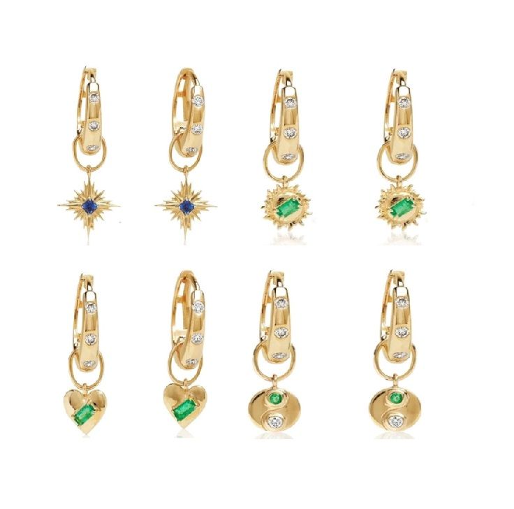 Una colección de pendientes de aro de oro versátiles y cambiables (JRE-127) exhibidos con una variedad de charms de piedras preciosas y perlas de colores.
