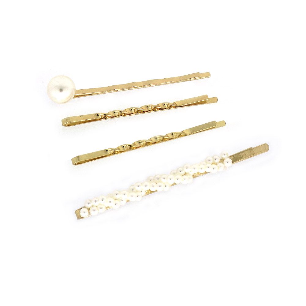 A set of four fashionable gold-plated pearl hair pins, showcasing different elegant designs for versatile styling.