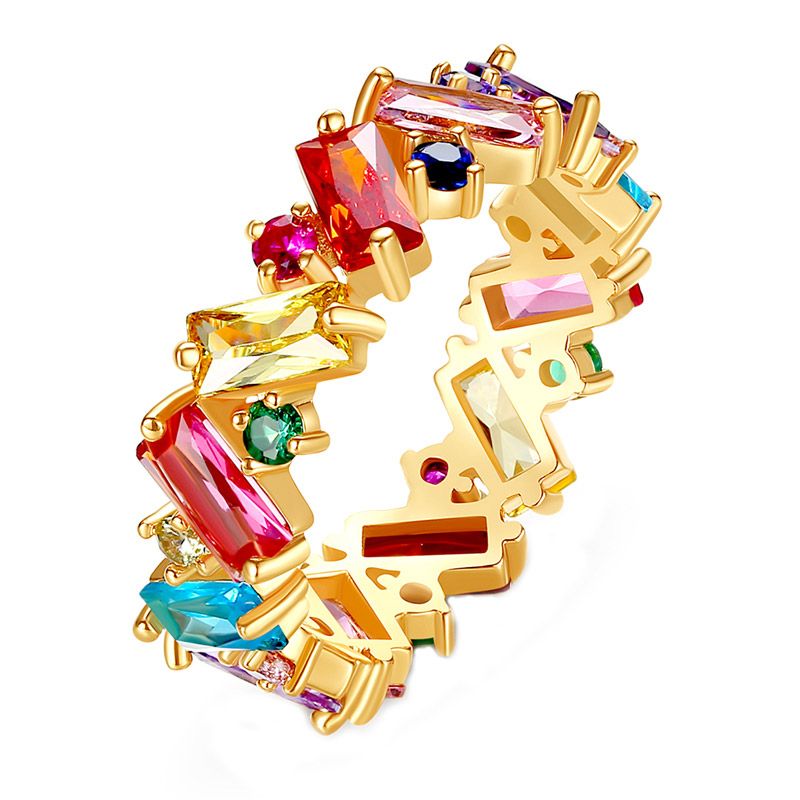 A close-up of the ZigZag Rainbow Baguette Ring in 14k yellow gold plating, showcasing its vibrant multi-color cubic zirconia stones.