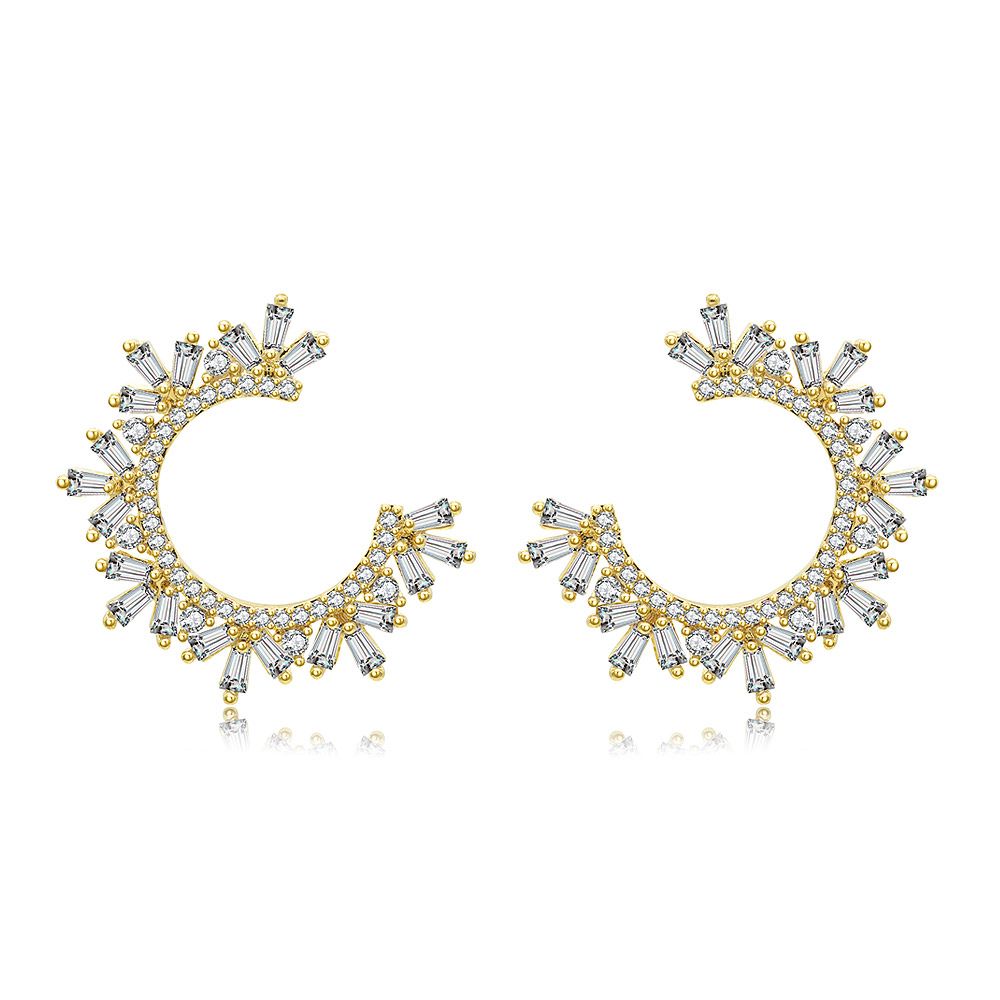 A pair of Gold Plated Baguette CZ Circle Earrings showcasing a brilliant sunburst design with clear cubic zirconia gemstones on a white background.