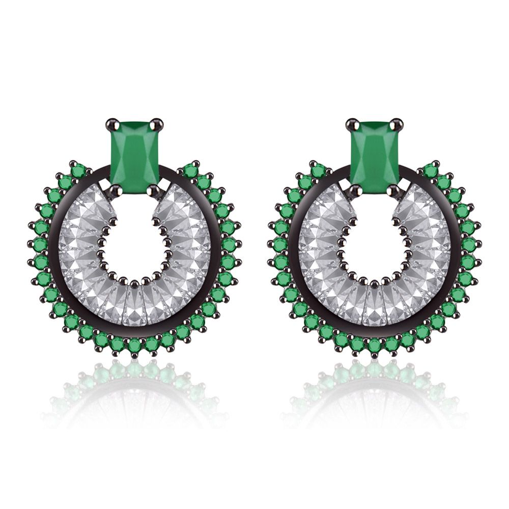 A pair of stunning emerald CZ stud earrings featuring a central green stone surrounded by a halo of clear cubic zirconia, set in dark hematite-plated brass.