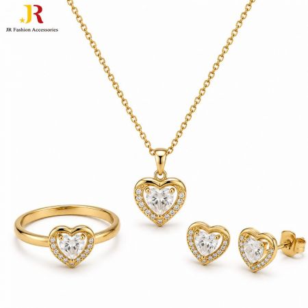 Guldhjärtat kubisk zirkonia smyckeset inklusive grossist ring, halsband och studsörhängen av JR Fashion.