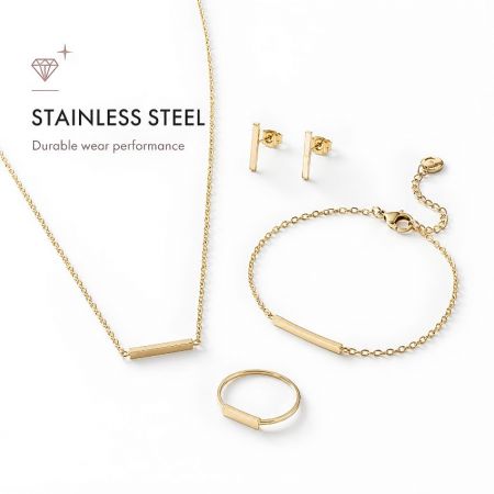 Engros hållbart rostfritt stål guld smyckeset: minimalistiskt stavhalsband, örhängen, armband och ring.