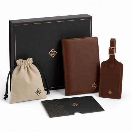 Corporate travel gift set featuring custom leather passport holder, luggage tag, and luxury box.