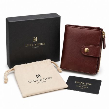 Luxe and Hide personalized bi-fold leather wallet with zipper pocket, dust bag, and thank you card.