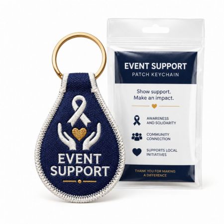 Llavero de parche bordado de cinta de concienciación para eventos benéficos sin fines de lucro en empaque promocional sellado.