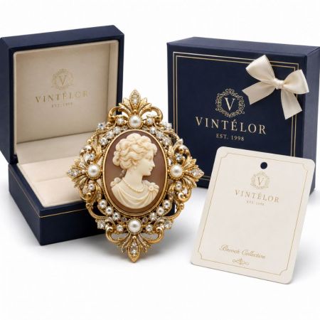 Vintage style oversized oval cameo brooch with gold filigree border, pearls, and premium display gift box.