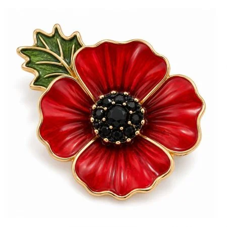Poppy Brooch - Red enamel poppy brooch with green leaf and black crystal center, premium fashion accessory close-up shot.