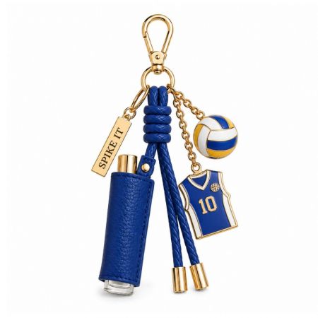 Charm per borsa da pallavolo personalizzata con cordino in pelle intrecciata blu, maglia sportiva, ciondolo a forma di pallavolo e etichetta dorata incisa.