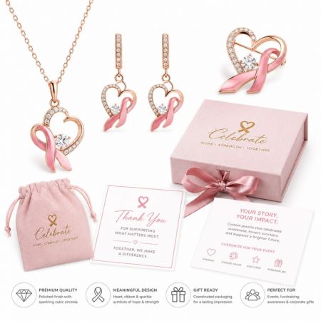 Premium breast cancer awareness ribbon jewelry sets with custom gift boxes for charity events and corporate gifts.