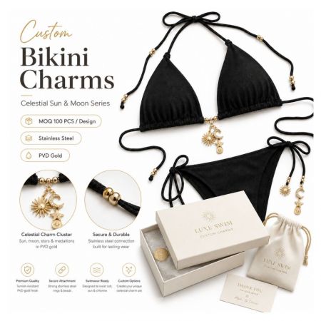 Celestial sun and moon swimwear charms on a black bikini with tarnish-resistant PVD gold plating for B2B supply.