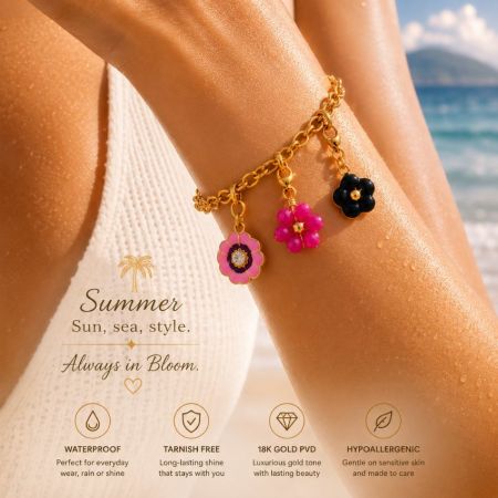 Gold flower charm bracelet on a model's wrist, illustrating waterproof 18K PVD plating for beach lifestyle jewelry.