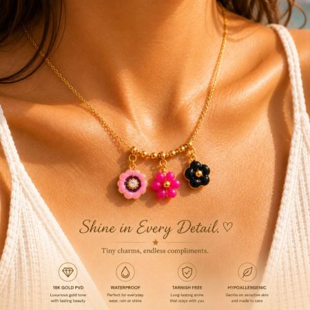 Hypoallergenic 18k gold PVD flower charms worn as a necklace, demonstrating high-quality finishes for B2B procurement.