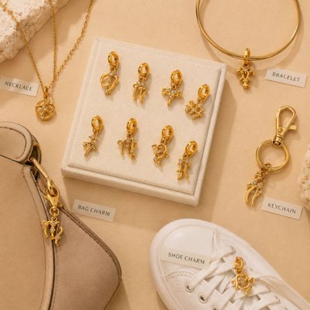 Tableau des tailles et spécifications techniques pour un charm en signe du zodiaque en acier inoxydable léger de 0,6 g avec strass.