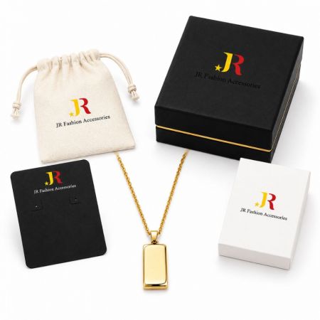 White label gold rectangular pendant necklace displayed with custom branded boxes and pouches for B2B jewelry wholesale.