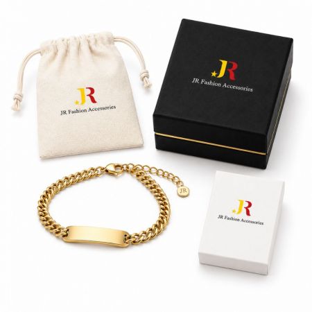 Gold Cuban link ID bracelet with custom branded pouch and boxes, designed for B2B white label jewelry wholesale markets.