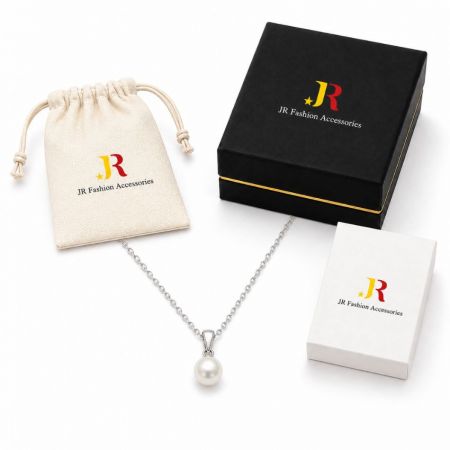 Classic pearl pendant necklace displayed with white label branded packaging for B2B jewelry wholesale and OEM suppliers.