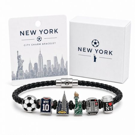 New York city charm bracelet in black braided leather with custom enamel Statue of Liberty and soccer ball beads.
