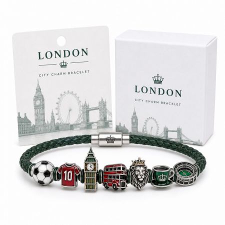 London city charm bracelet in green leather with custom enamel Big Ben, double-decker bus, and lion head charms.