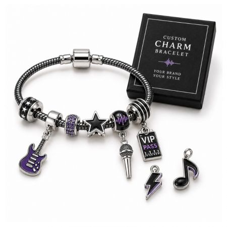 Custom music theme charm bracelet featuring silver snake chain, purple guitar, microphone, and VIP pass charms.