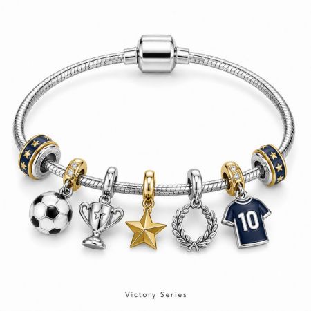 Victory series snake chain bracelet featuring dangling silver soccer ball, trophy, star, wreath, and jersey charms.