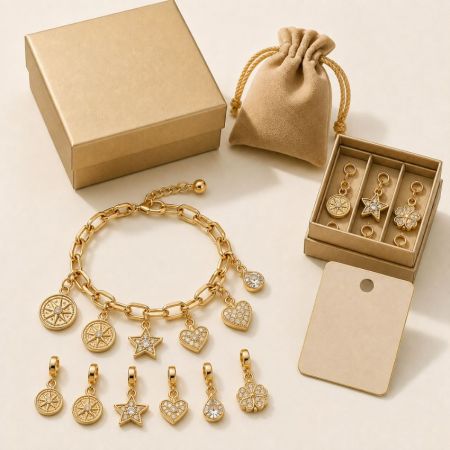 Gold link chain bracelet featuring star and compass charms, suitable for customizable jewelry wholesale export.
