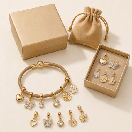 Genuine leather charm bracelet with gold floral and butterfly pendants, ideal for custom jewelry manufacturer showroom.
