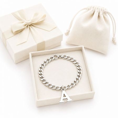 Initial Charm Bracelet - Silver curb chain bracelet with an initial A charm in a jewelry gift box, ideal for personalized jewelry wholesale.